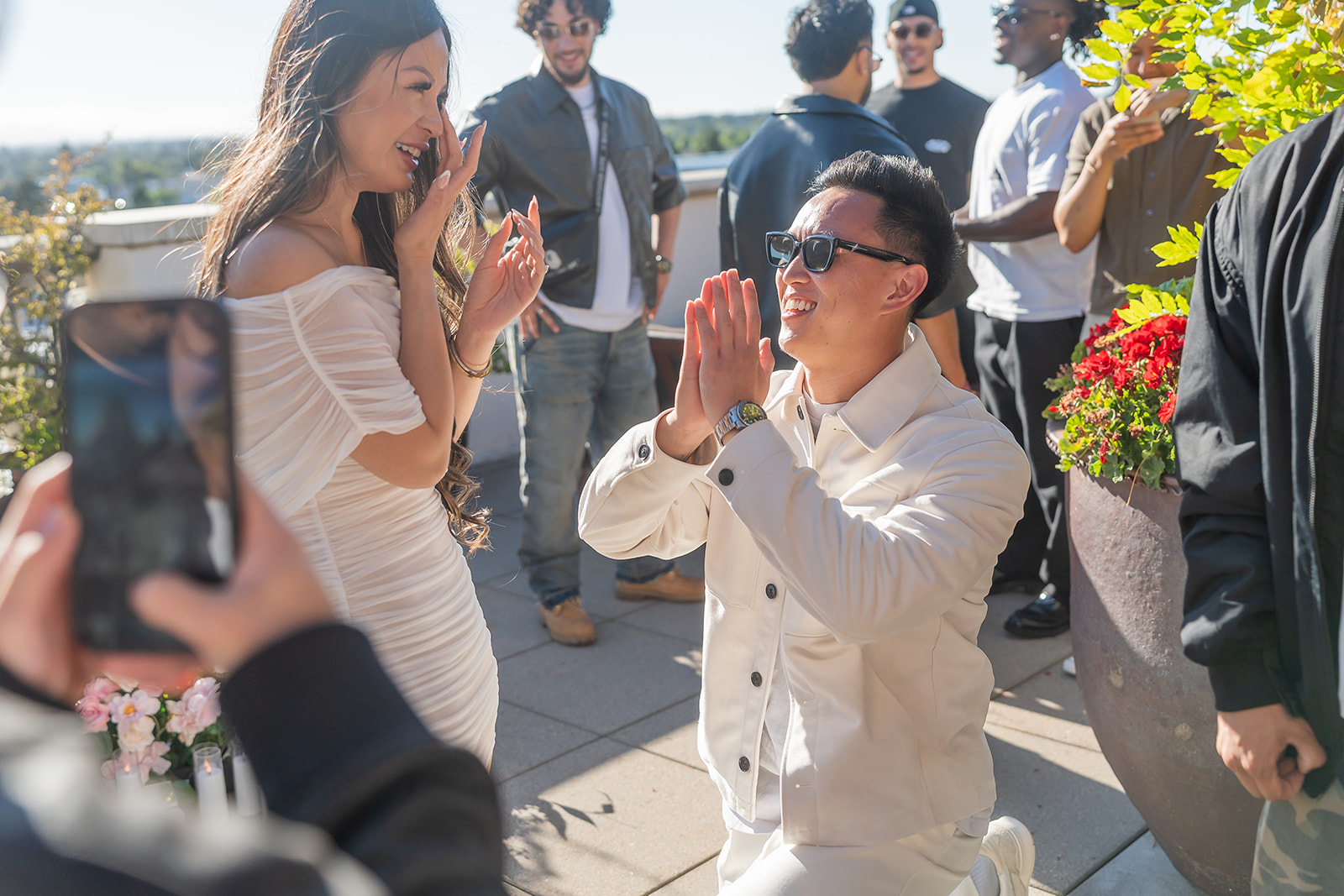 Couple celebrating together after a Cielo Rooftop proposal in San Jose