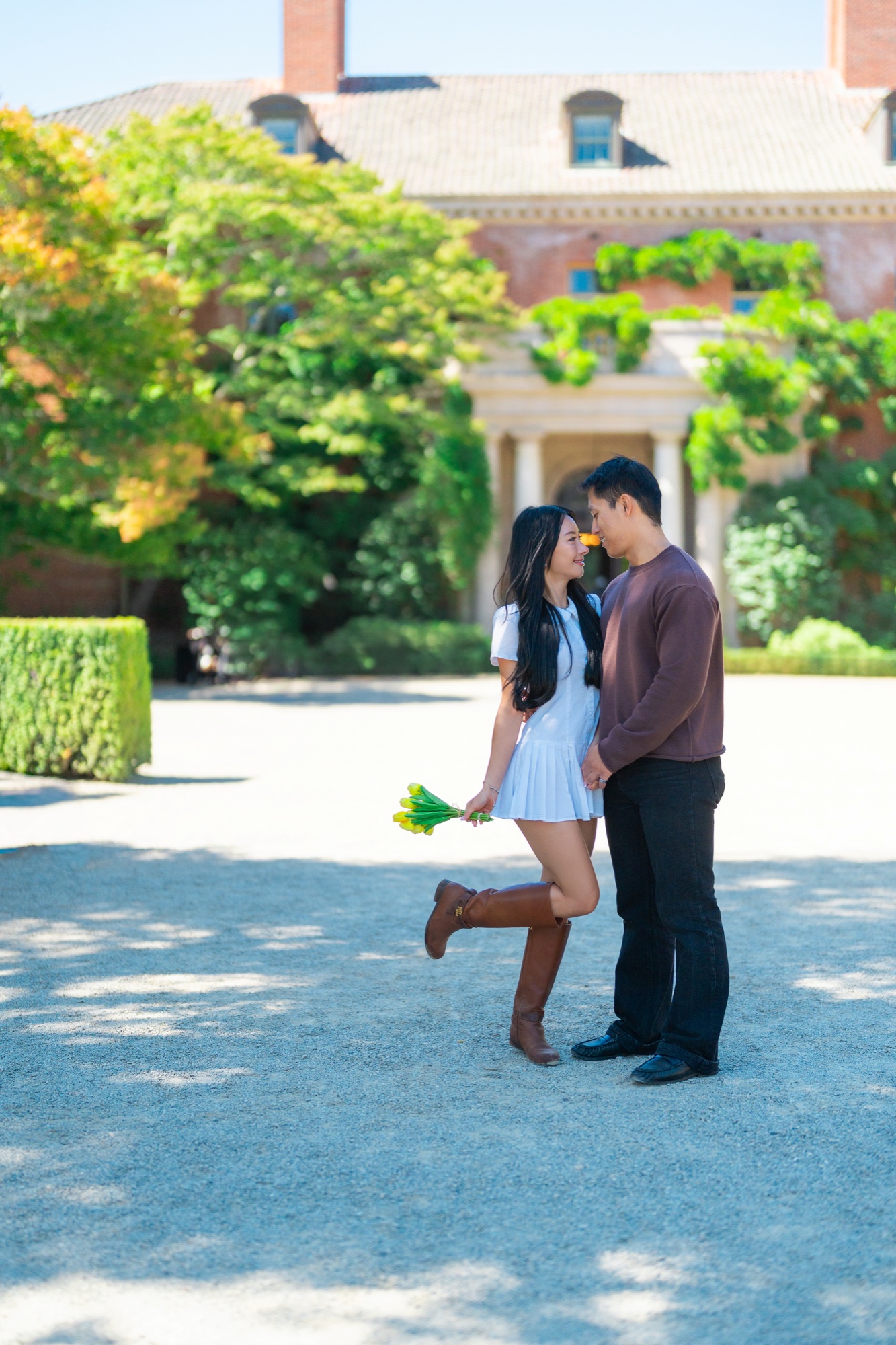 Ernest and Alexandra standing together in front of Filoli’s historic house